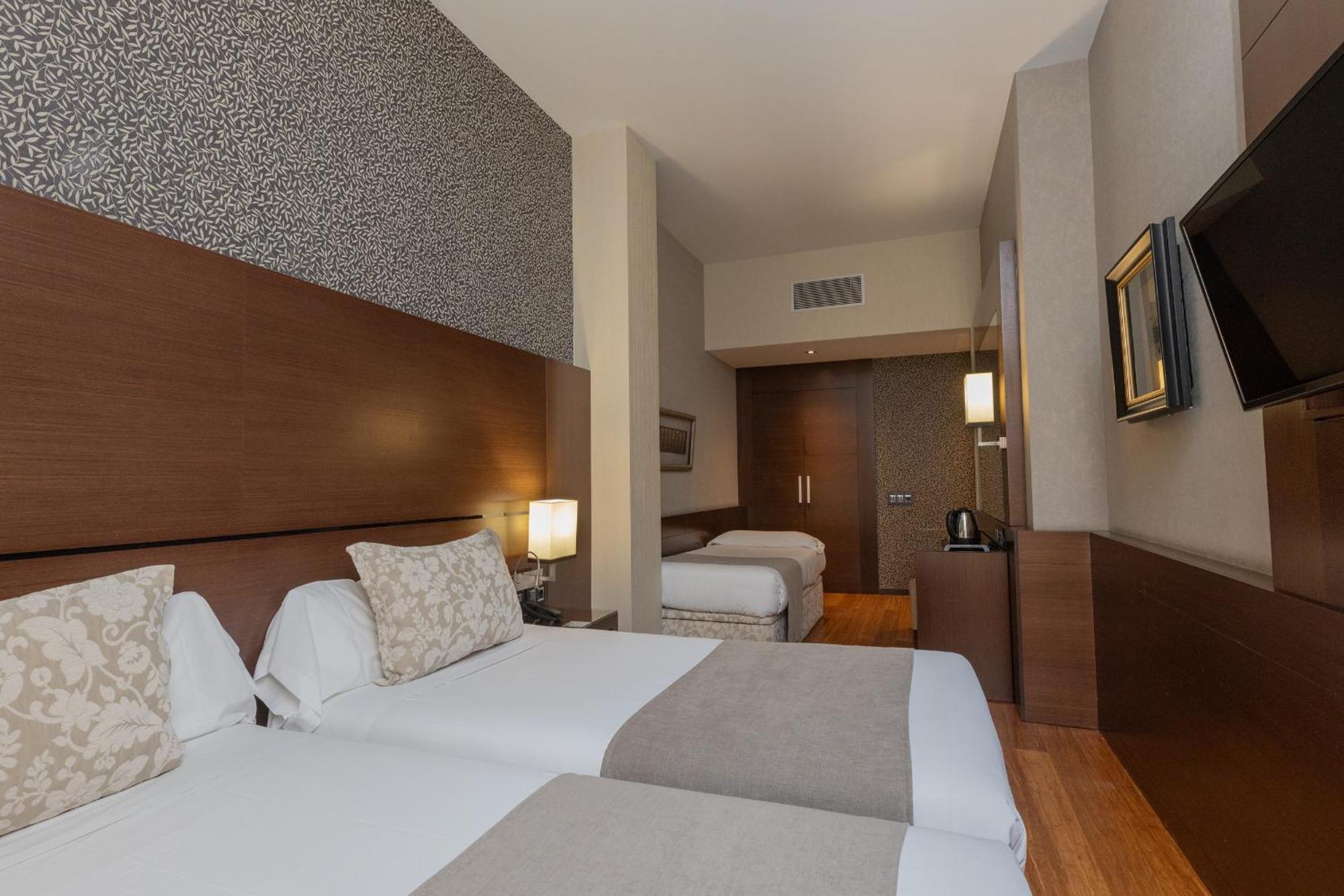 Quarto Twin com Cama Extra